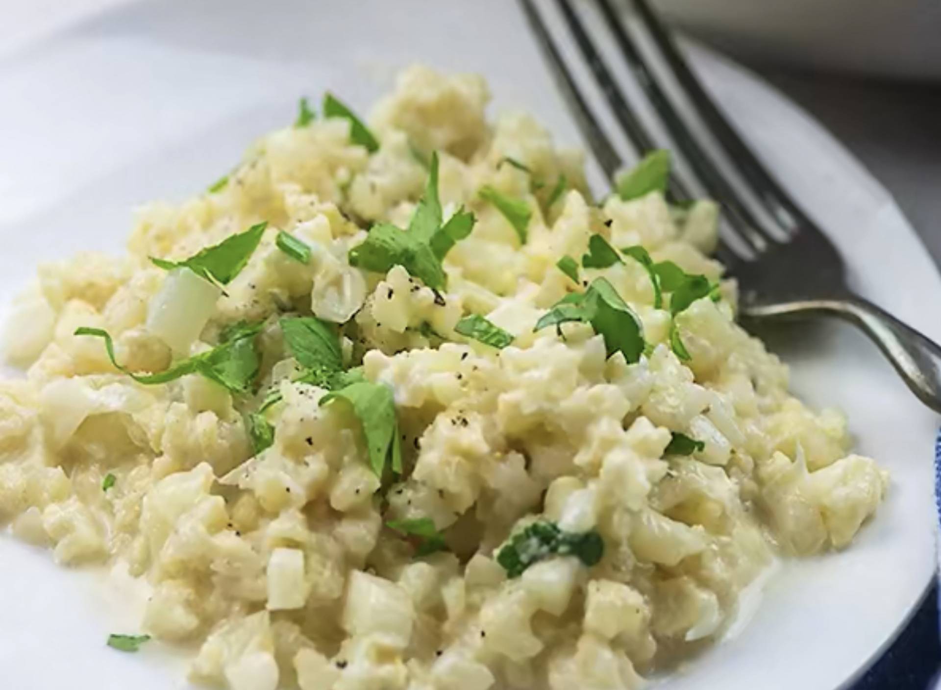 Tilapia con risotto de coliflor